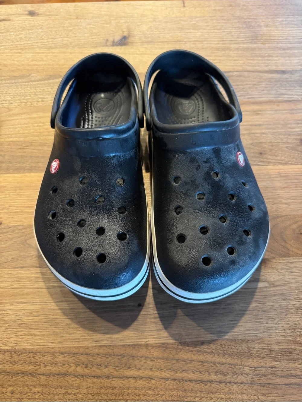 CROCS Black Clog Sandals with White Stripe